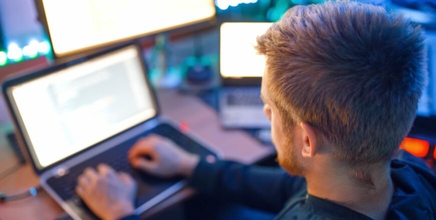 programmer-using-laptop-and-pc-information-coding.jpg